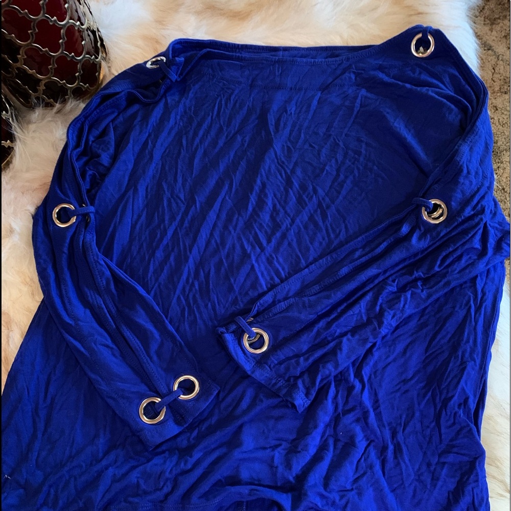 SOLD. Blue top